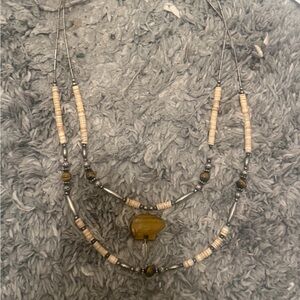 Triple-Strand Beaded Necklace with Olive-Green Stone Pendant